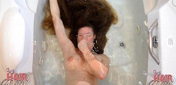  longhaired blonde milf dunking head in water